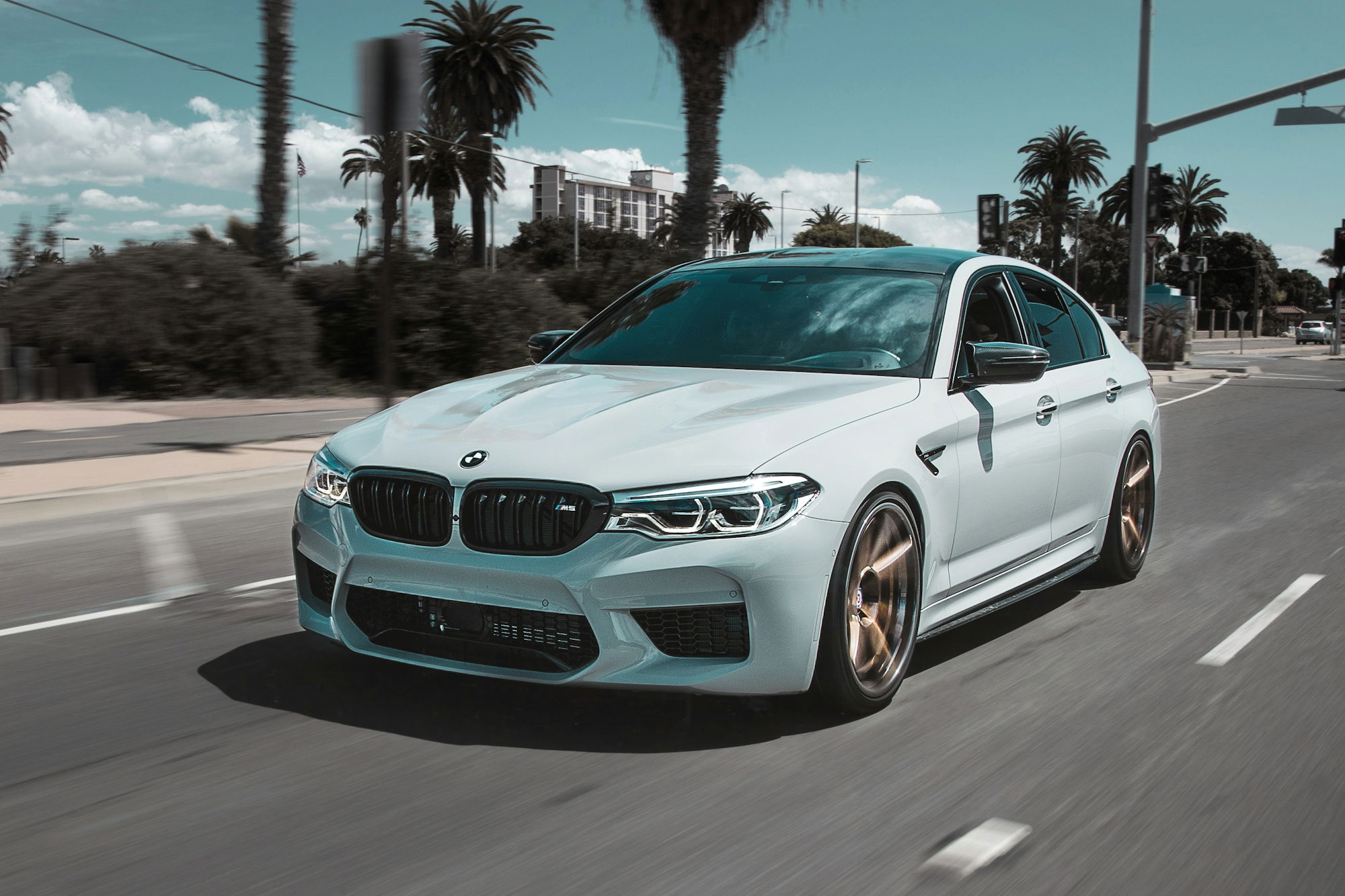 white-bmw-car-on-street.jpg white BMW car on street
